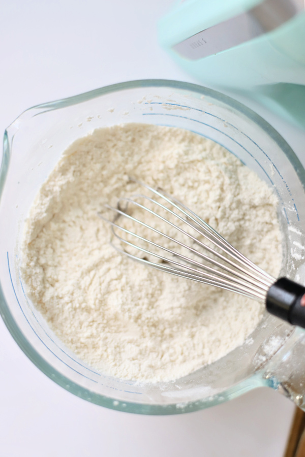 Blending dry ingredients for coconut banana quick bread.