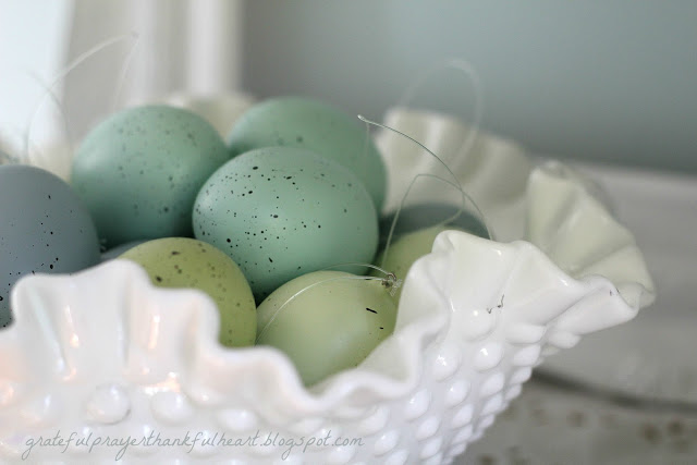 Easy DIY Powder Room redo in Aqua frost paint color with pretty white accents found around the house and re-purposed to create a lovely room on a budget.