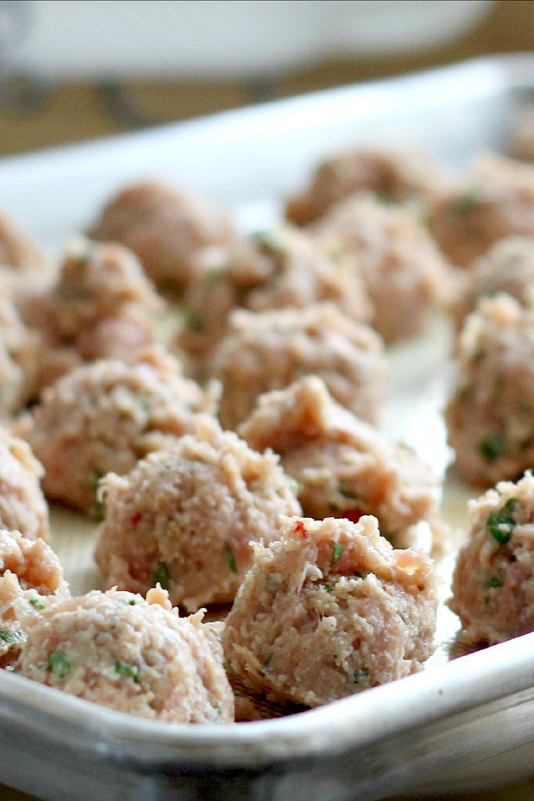 Tender meatballs made with ground chicken and sausage with pasta and vegetables in this easy recipe for classic Italian Wedding Soup. A delicious soup!