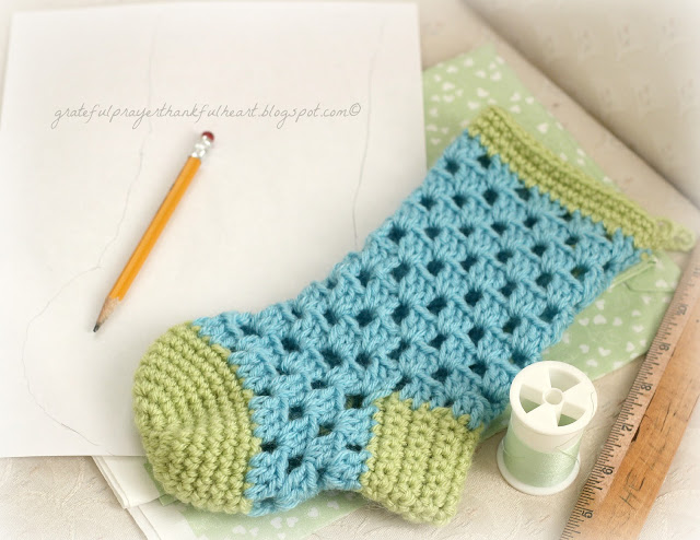 Pattern for crochet stocking for baby's 1st Christmas, It is lined with fabric to keep treasures safely inside. Just the right size for baby.