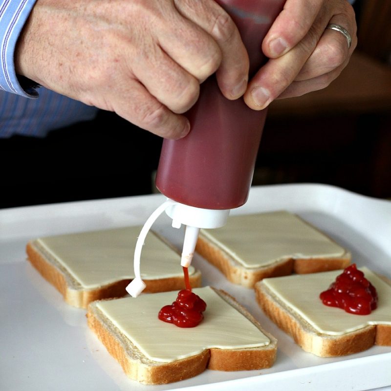 Pizza Toast is a unique family food creation passed down through the generations. Simple, tangy, tasty and delicious, this dad proudly prepares his childhood treat with all seriousness.