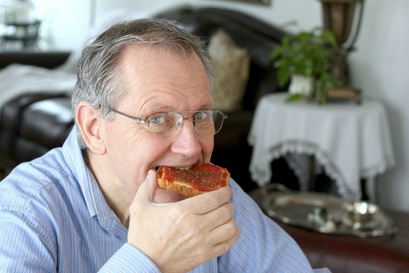 Pizza Toast is a unique family food creation passed down through the generations. Simple, tangy, tasty and delicious, this dad proudly prepares his childhood treat with all seriousness.