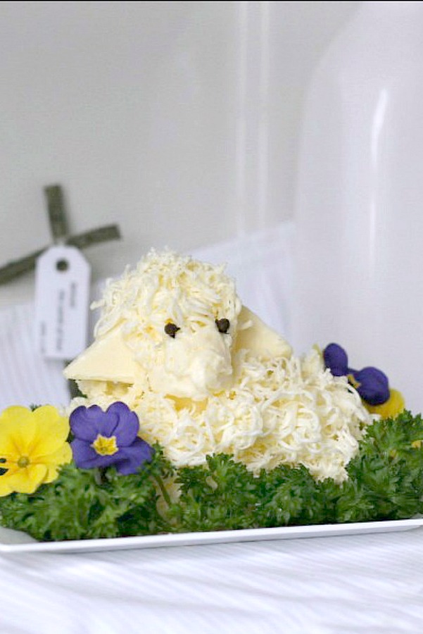 Easy directions to create this sweet little Easter butter lamb, covered in woolly curls. These sweet butter sculptures traditionally accompany the Easter meal for many Russian, Slovenian and Polish families. Butter is shaped into a lamb and is cute, decorative and symbolic for your holiday table.