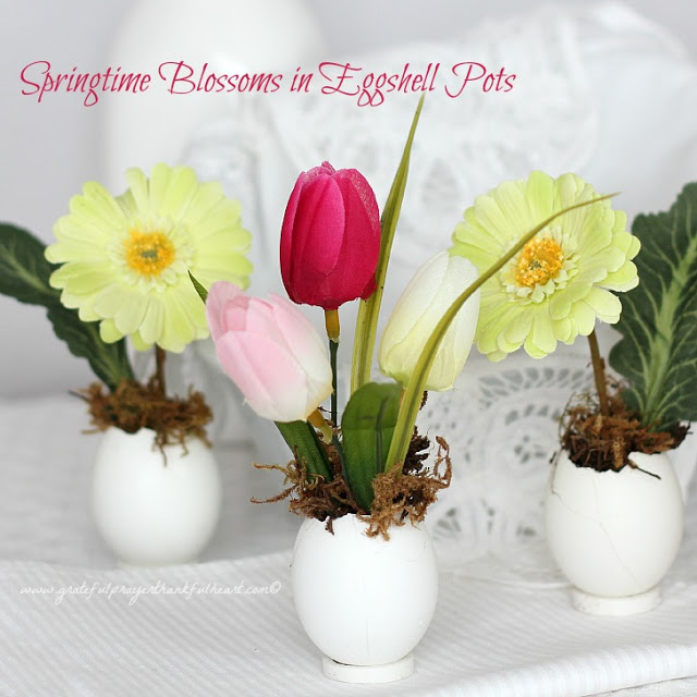 Sweet and dainty, springtime Easter flowers in eggshell pots are super cute. Fill with faux flowers, fresh cut flowers or plant seeds and watch them sprout. Tuck into spaces needing some happy after a dreary winterscape.