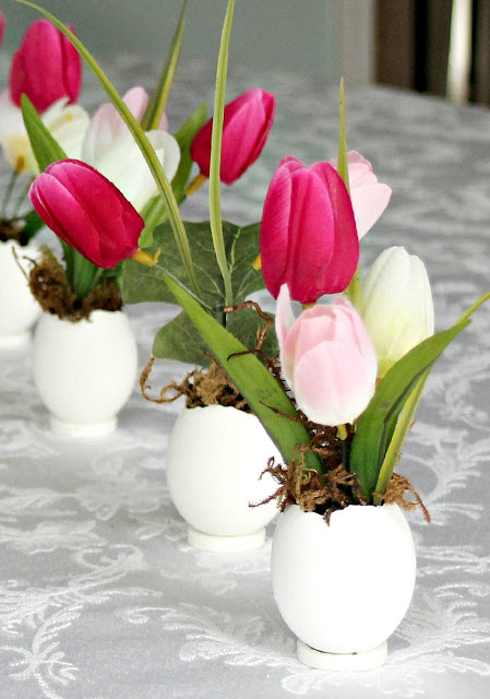 Sweet and dainty, springtime Easter flowers in eggshell pots are super cute. Fill with faux flowers, fresh cut flowers or plant seeds and watch them sprout. Tuck into spaces needing some happy after a dreary winterscape.