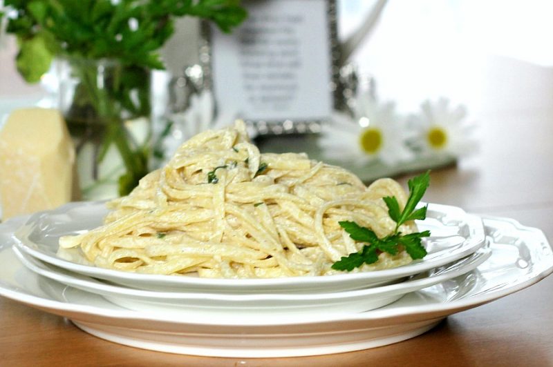 Sage-infused Fettuccine Alfredo is an easy recipe for a lighter, healthier version of Fettuccine Alfredo. Serve with a crisp salad or topped with grilled chicken for a lovely Easter dinner, romantic Valentine's Day or whenever you want a special pasta meal. 