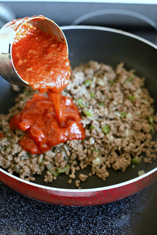 Classic stuffed peppers are an easy and comforting meal of tender bell peppers filled with ground beef and rice, baked and topped with your favorite sauce. 