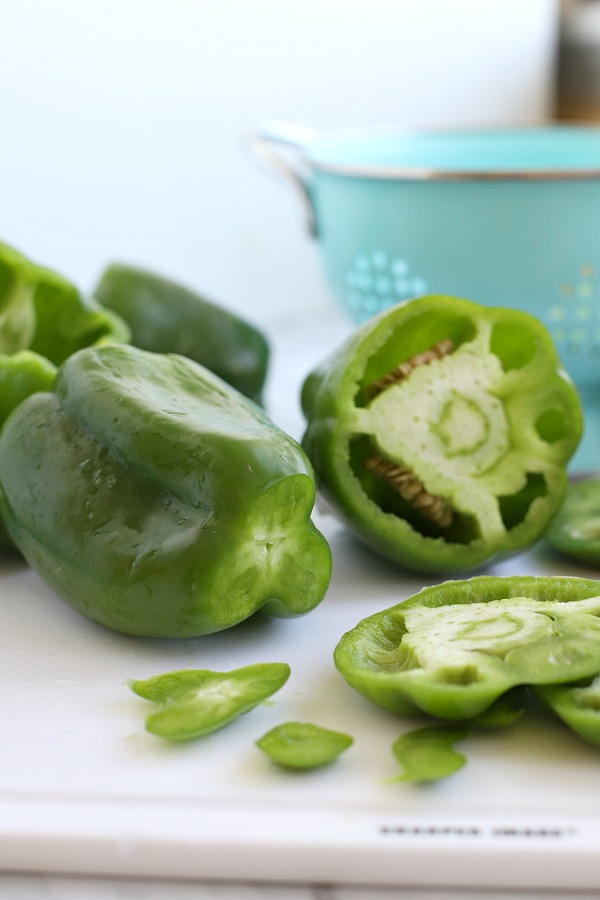 Classic stuffed peppers are an easy and comforting meal of tender bell peppers filled with ground beef and rice, baked and topped with your favorite sauce. 