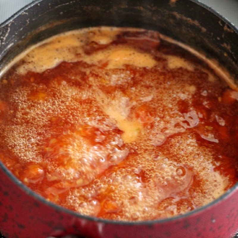 Vintage recipe for Grandmom's Tomato Jam is made using just tomatoes, sugar and lemon or lime juice. Delicious on toast or biscuits and on a cheese board. Perfect use for garden fresh tomatoes and a lovely addition to a gift basket.