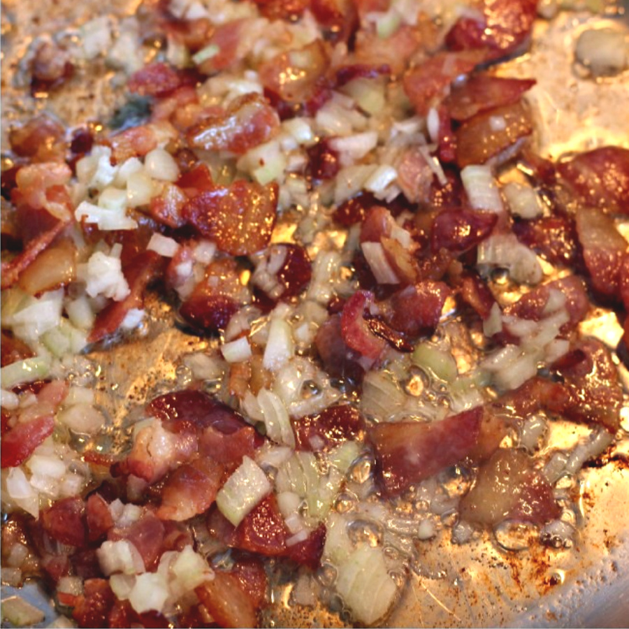 Easy recipe for bacon tomato jam, of sauteed bacon and sweet onions. A savory condiment with a little kick perfect for burgers, eggs and veggies.