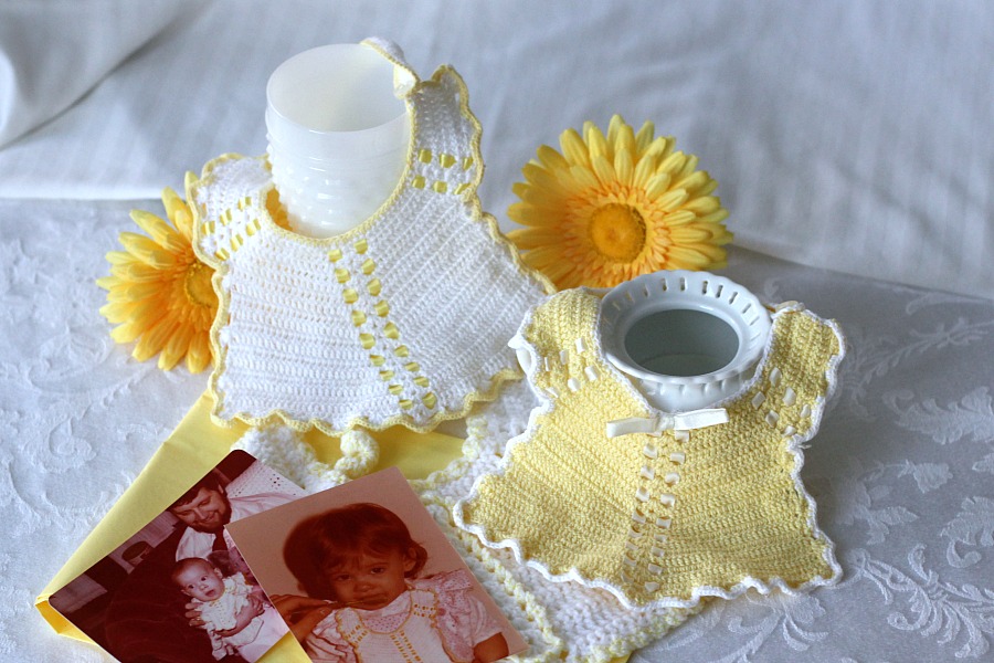 Sweet crochet baby bib is adapted from a vintage pattern and perfect for a toddler. Almost too pretty to use as a bib but adorable to dress up an outfit.