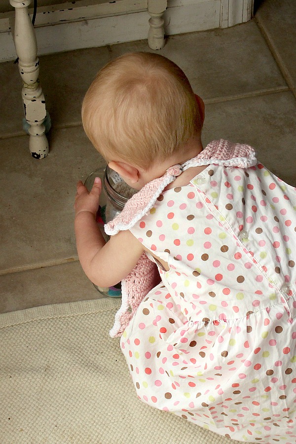 Sweet crochet baby bib is adapted from a vintage pattern and perfect for a toddler. Almost too pretty to use as a bib but adorable to dress up an outfit.