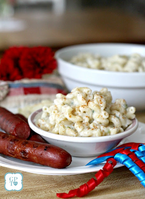 Easy recipe for a classic All-American Macaroni Salad. Perfect side dish for cookouts and barbecues. Serve with hotdogs, burgers, chicken and pork as you celebrate the 4th of July with food and fireworks!