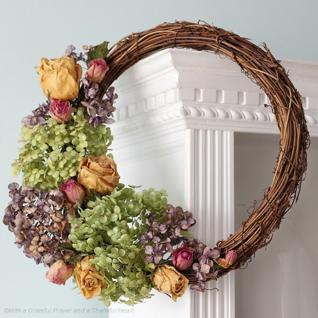 Preserve hydrangea, roses and garden flowers by drying then used to create a lovely wreath.