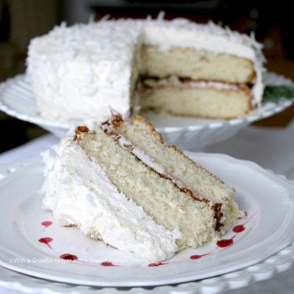 Brighten those winter blues with a lovely Winter's White lunch with friends. Tablescape and menu for snowflake rolls, quiche and a white cake with coconut frosting.