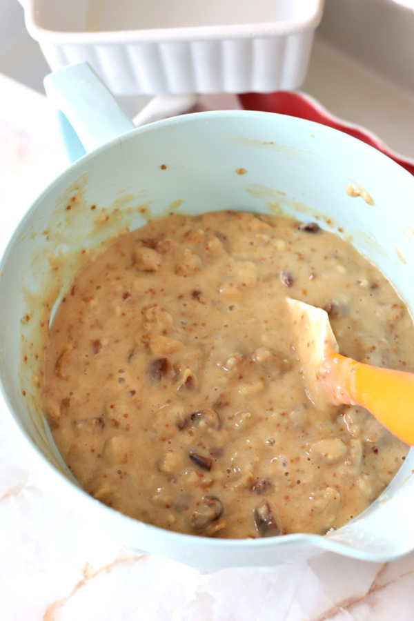 Making the batter for fig & date nut quick bread recipe.