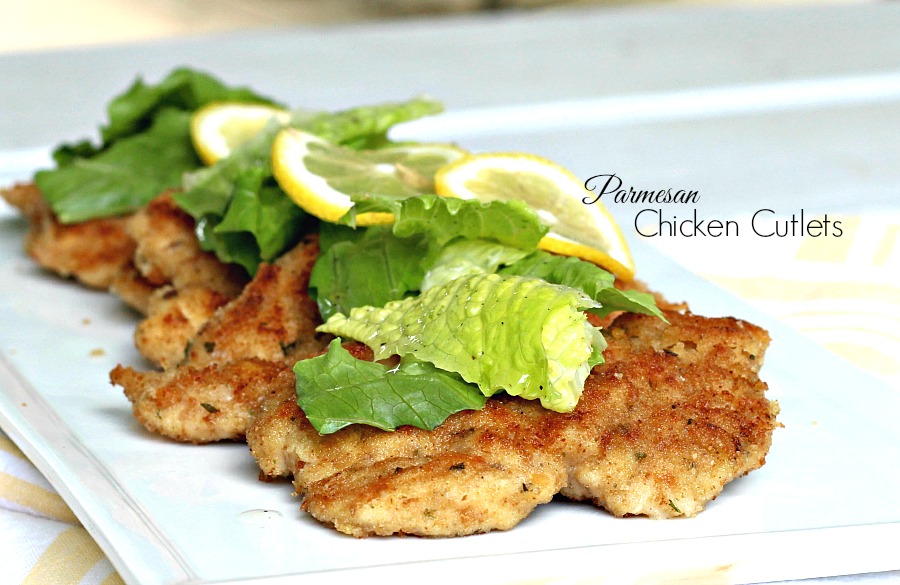 Parmesan Chicken Cutlets, pounded thin, then breaded and fried until crispy and golden are served with lettuce greens and a light lemony vinaigrette for a delicious meal elegant enough for company. 