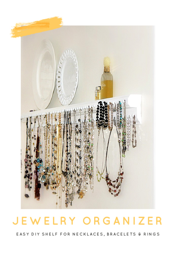 DIY wooden wall jewelry shelf organizer has plenty of hooks to keep necklaces and bracelets from tangling and within easy reach.