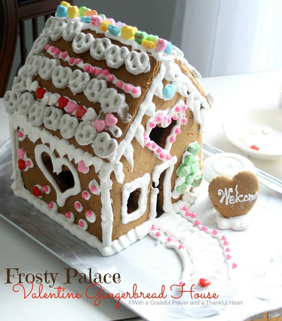 Super sweet Valentine's Day Gingerbread House is magical. Decorate with Royal Icing as the glue for favorite candy and treats. Great kids project.