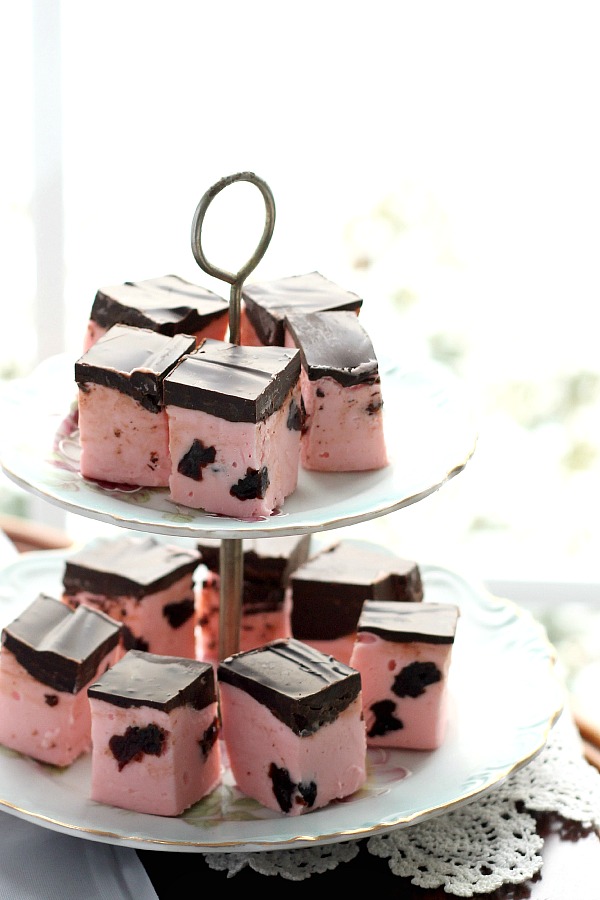 Cherry Fudge with Dark Chocolate is decadent with bits of dried cherries and topped with dark chocolate. Something this amazing should be difficult to make but not so with this easy recipe. Make a batch for someone you want to impress this Valentine's Day.