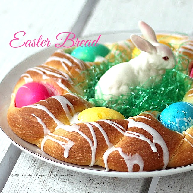 A beautiful Easter egg braided yeast bread tastes delicious and is so pretty with dyed eggs tucked into the braided ring then drizzled with a light glaze. Easy recipe using a bread machine to make the dough.