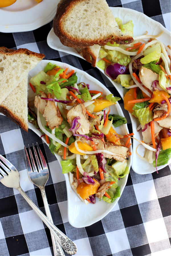 Chicken pineapple mango salad with romaine, carrots, bean sprouts, and chow mein noodles in a flavorful and refreshing dressing.