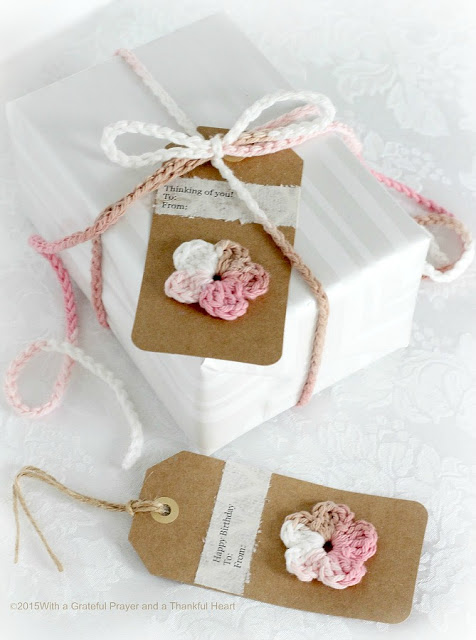 Embellish gift packages with quick and easy crochet gift tags, ties & bows. Reusable and so cute. Add tiny flowers, hearts, leaves and wreaths of yarn. 