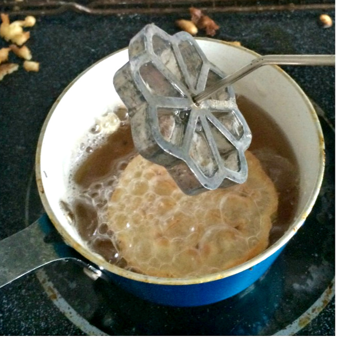 How-to recipe for Scandinavian Rosettes. These thin, cookie-like pastry treats are deep-fried until light and crispy. An easy recipe perfect on your holiday cookie tray or any time.