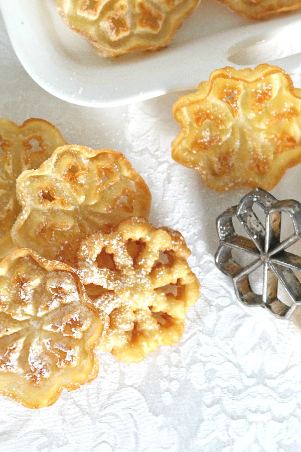 Easy recipe for Scandinavian Rosettes. Thin, cookie-like, deep-fried pastry treats are light and crispy. Perfect on your holiday cookie tray.