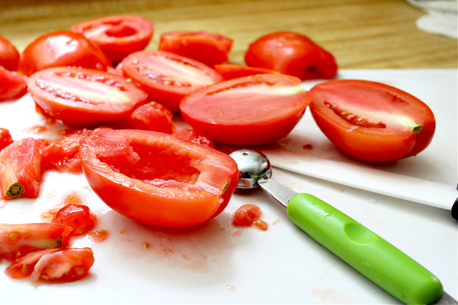 Preparing Roma tomatoes for roasted tomato Capresse salad