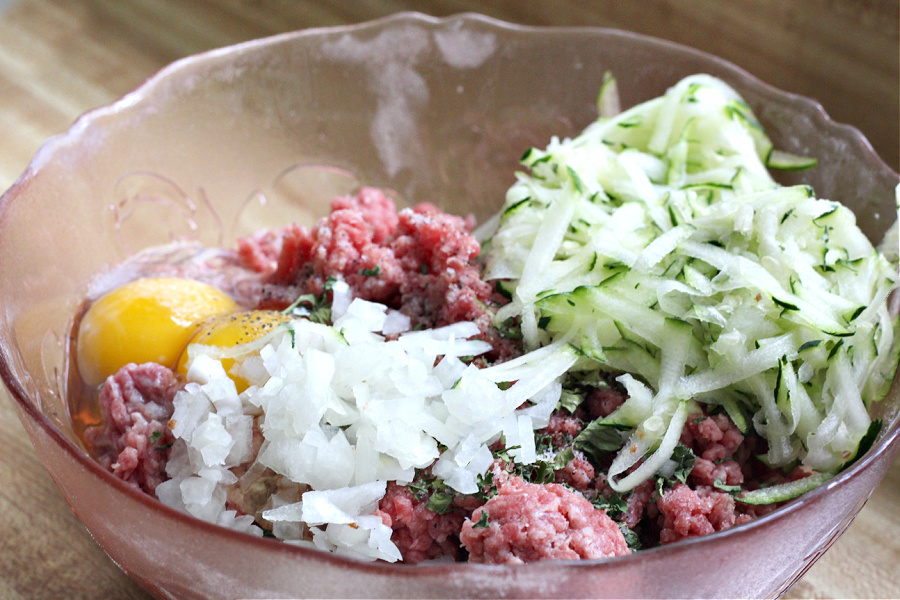 Add more veggies to your family meals. Try this delicious recipe for zucchini meatballs with shredded zucchini. So much flavor in these pan-fried meatballs.