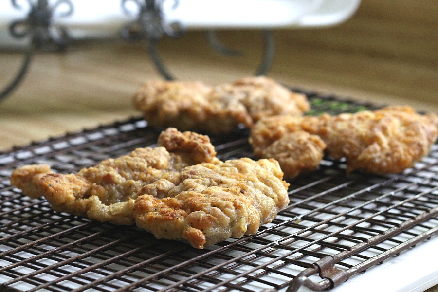 Crispy, moist and easy fried chicken with creamy mashed potatoes is a great comfort meal. It begins with boneless chicken thighs cooked in a skillet.