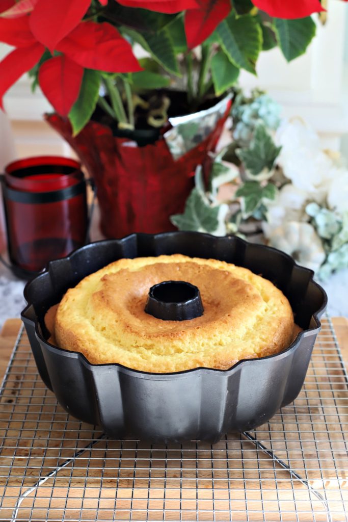 Rum Cake baked and cooling on a rack.