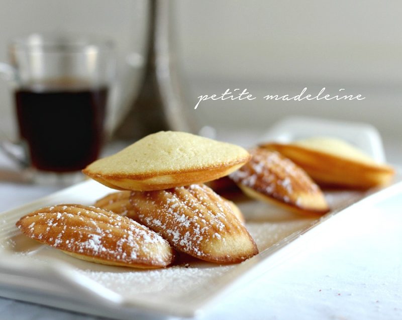 Madeleines are small sponge cakes with a distinctive shell-like shape.  These little cakes are browned and crispy on the outside and spongy and soft on the inside. Lemon Glazed French Madeleines are a perfect accompaniment to your afternoon cup of tea.