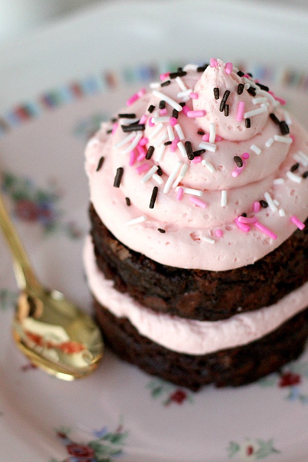 Tequila Rose Strawberry Cream Frosting is a pretty-in-pink Valentine's Day dessert and a snap to make.  Bake up a batch of brownies or cupcakes, pipe on the frosting; sprinkle with jimmies then share with the love of your life!