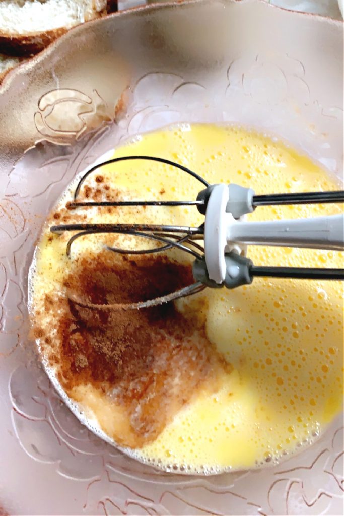 adding spices, sugar and milk to eggs for French toast