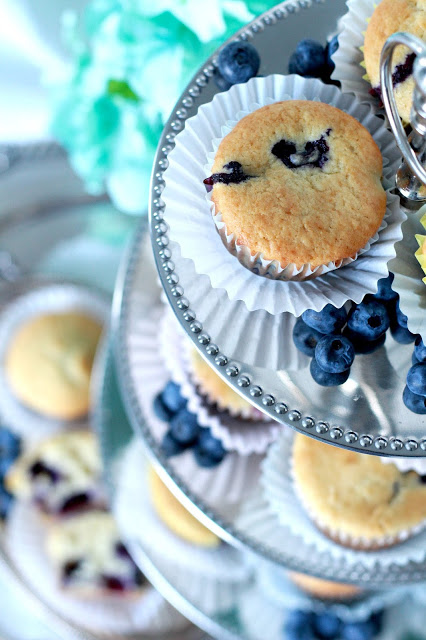 Use fresh or frozen blueberries to make yummy, cake-like muffins. Substitute applesauce for some of the butter to make them a little healthier.