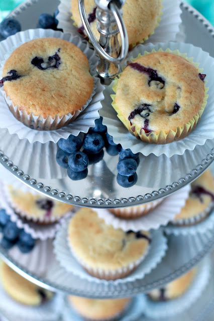 Use fresh or frozen blueberries to make yummy, cake-like muffins. Substitute applesauce for some of the butter to make them a little healthier.