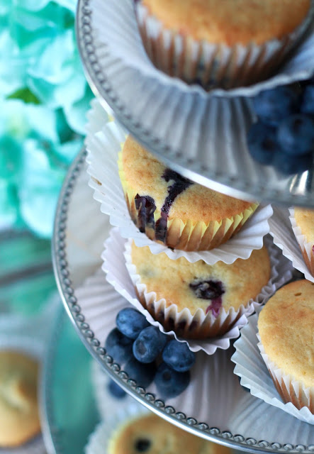 Use fresh or frozen blueberries to make yummy, cake-like muffins. Substitute applesauce for some of the butter to make them a little healthier.