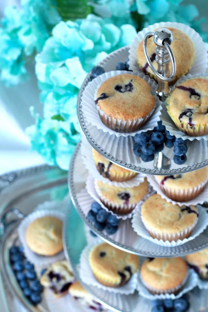 Use fresh or frozen blueberries to make yummy, cake-like muffins. Substitute applesauce for some of the butter to make them a little healthier.