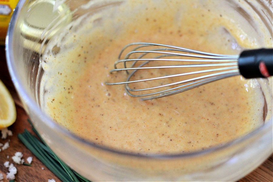 Wet ingredients for classic crab cakes recipe.