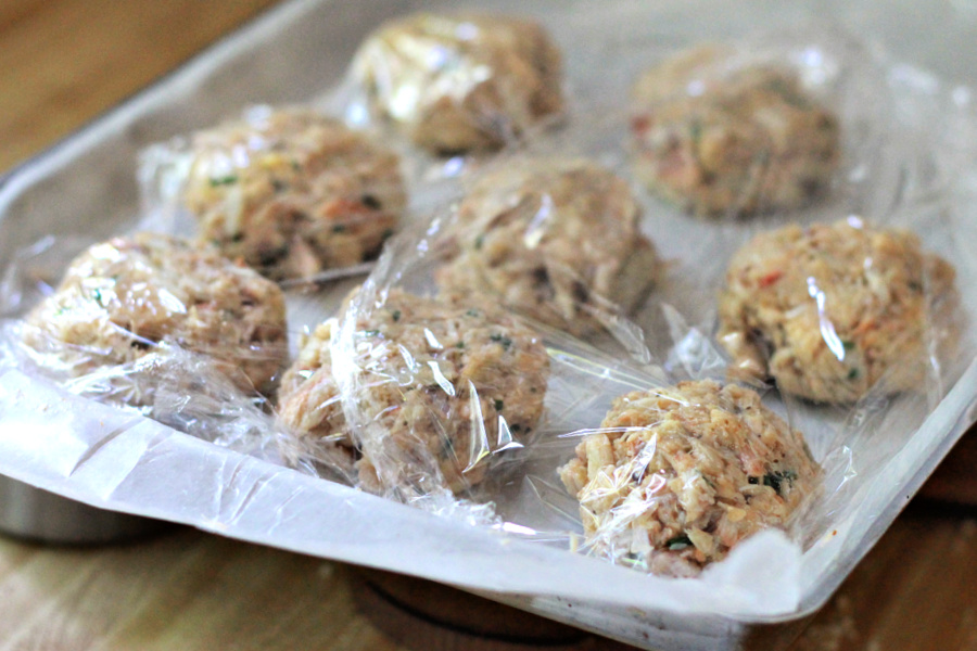 Chilling classic crab cake patties prior to frying.