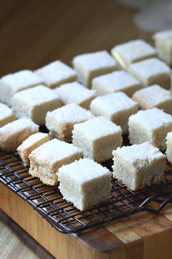 Call them biscuits or cookies, shortbread are delicious morsels of crumbly, buttery and delicate sweetness. Easy recipe for classic treats drizzled with or without lemon glaze.