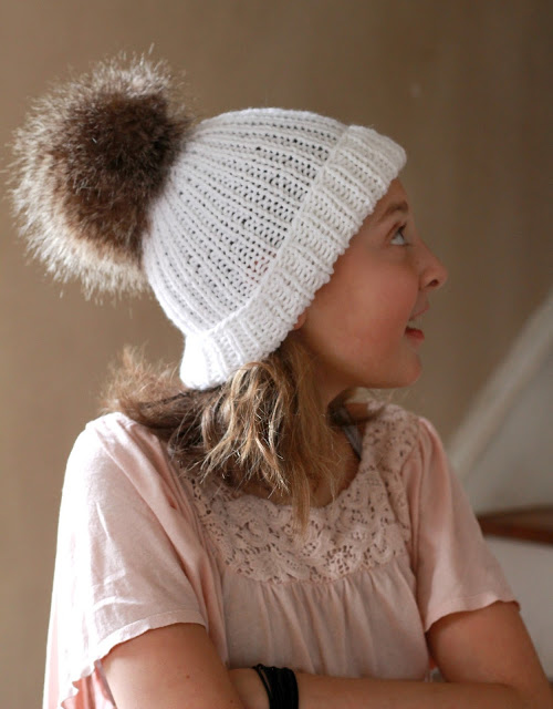 Make your own faux fur pom poms for hats and crafts easily and inexpensively. Check out this tutorial, How-to Faux Fur Pom Pom on Knitted Toque with link to easy knitted hat pattern.