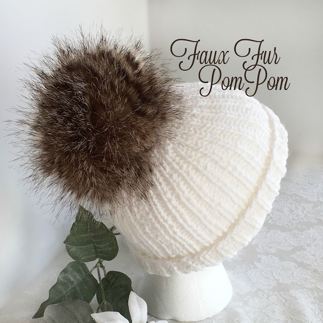 Make your own faux fur pom poms for hats and crafts easily and inexpensively. Check out this tutorial, How-to Faux Fur Pom Pom on Knitted Toque with link to easy knitted hat pattern.