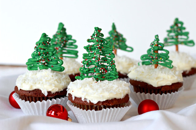 Easy to make, Chocolate Pretzel Christmas Tree Cupcake Toppers look so festive atop coconut frosted cupcakes. A yummy and decorative Christmas treat.