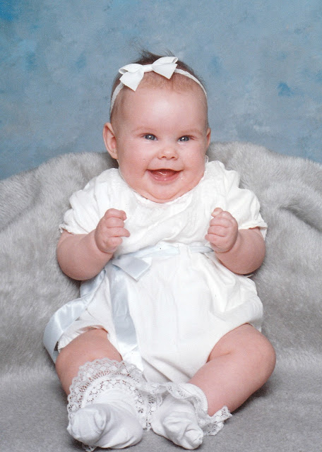 Tradition of children and grandchildren wearing their grandfather's vintage Christening outfit.