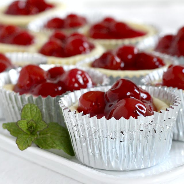 Looking for a delicious and easy to make dessert? Try Cherry Cheese Cupcakes. They are always a favorite and look so pretty. Perfect for bridal or baby showers, parties and holidays like Valentine's Day. Top with pie filling of choice. Easy to serve with no slicing too. 