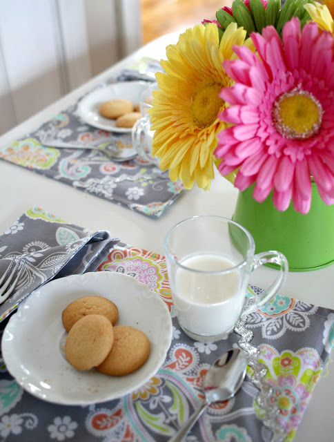 Easy sewing project of reversible kid-sized place mats and cloth napkins for child's table and chair kitchen set