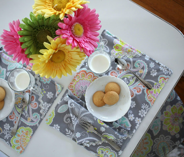 Easy sewing project of reversible kid-sized place mats and cloth napkins for child's table and chair kitchen set